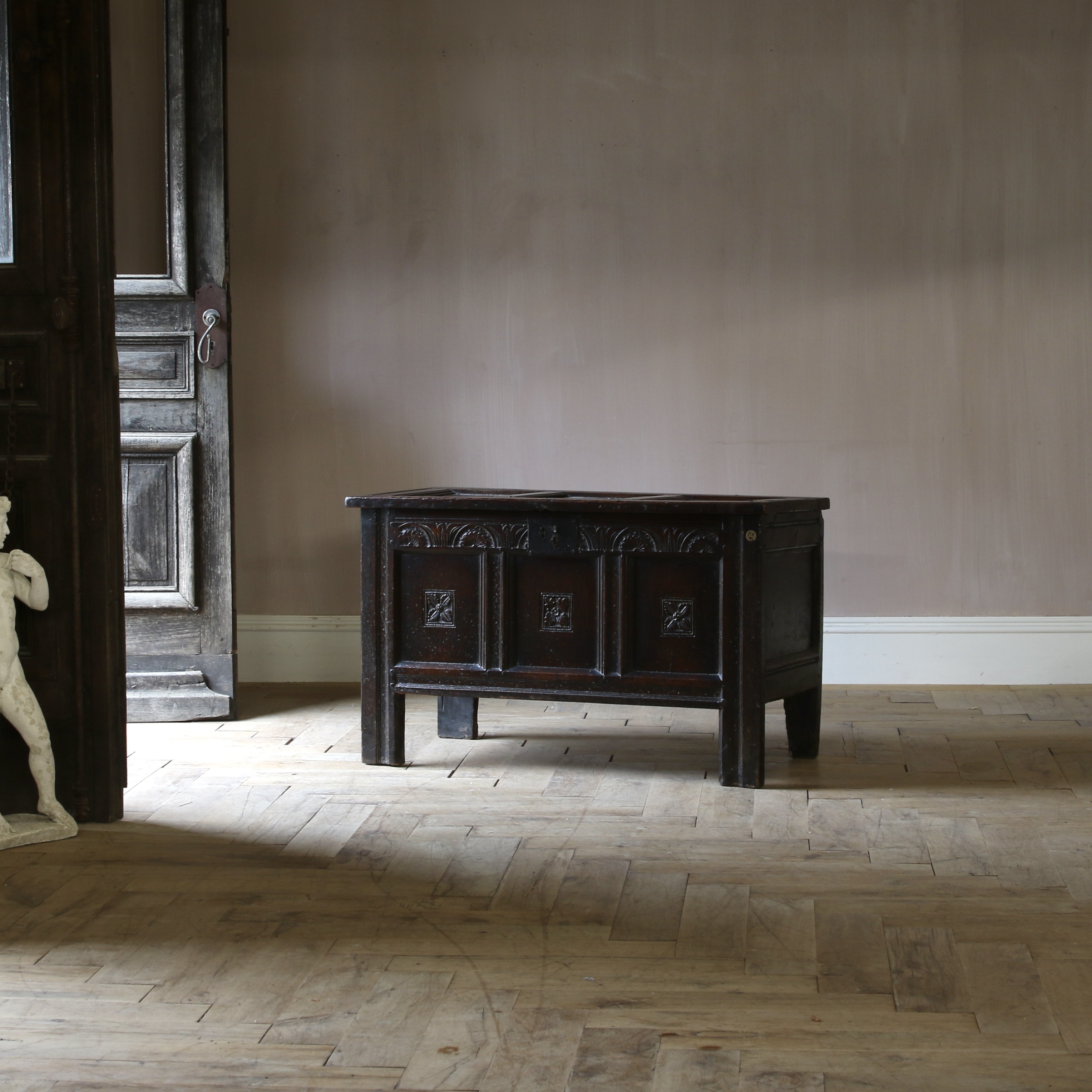 150-95 - A Jacobean Oak Panelled Coffer